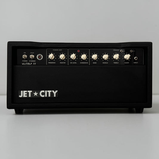 A black JET CITY Humble 22 guitar amplifier head with cream knobs and white branding, photographed against a neutral light gray background.